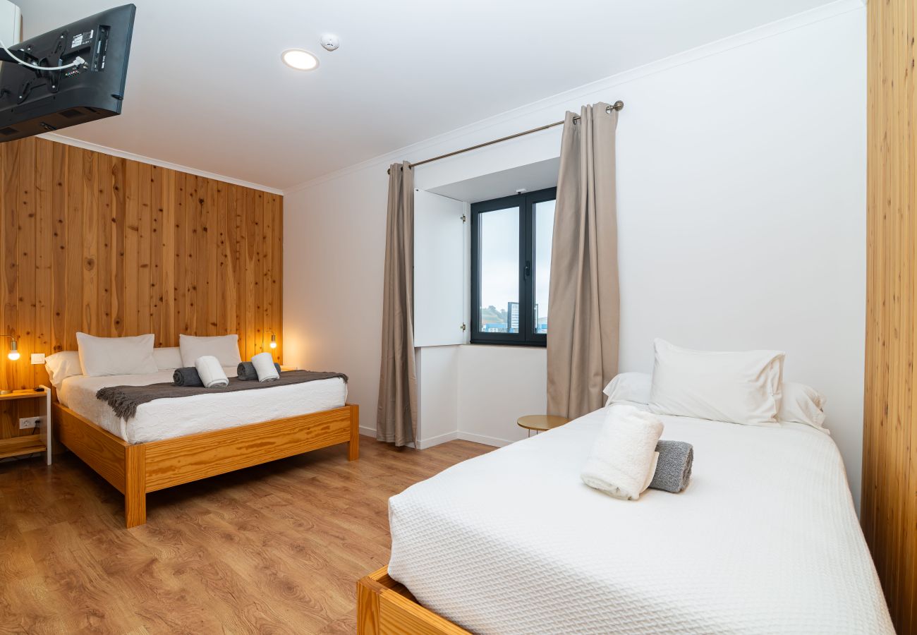 Rent by room in Capelas - Vila Rosario - Standard Room 1