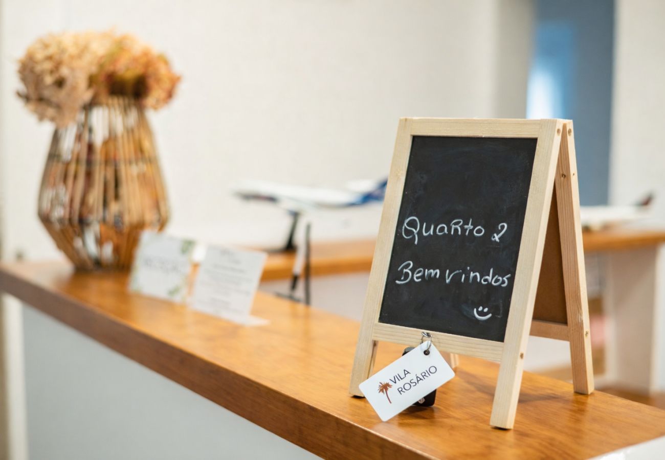 Rent by room in Capelas - Vila Rosario - Suite Room