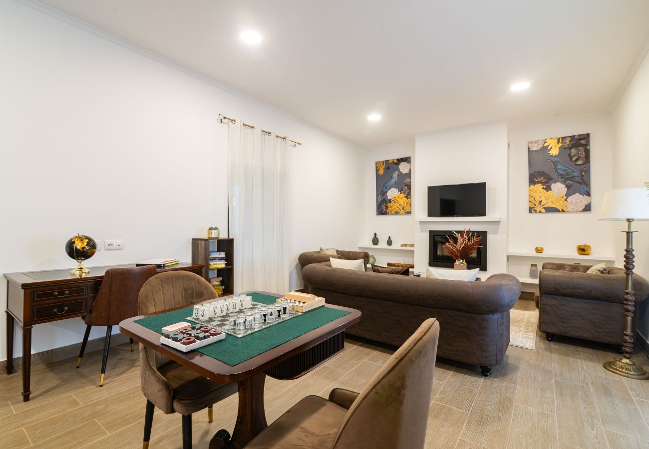 Rent by room in Capelas - Vila Rosario - Suite Room